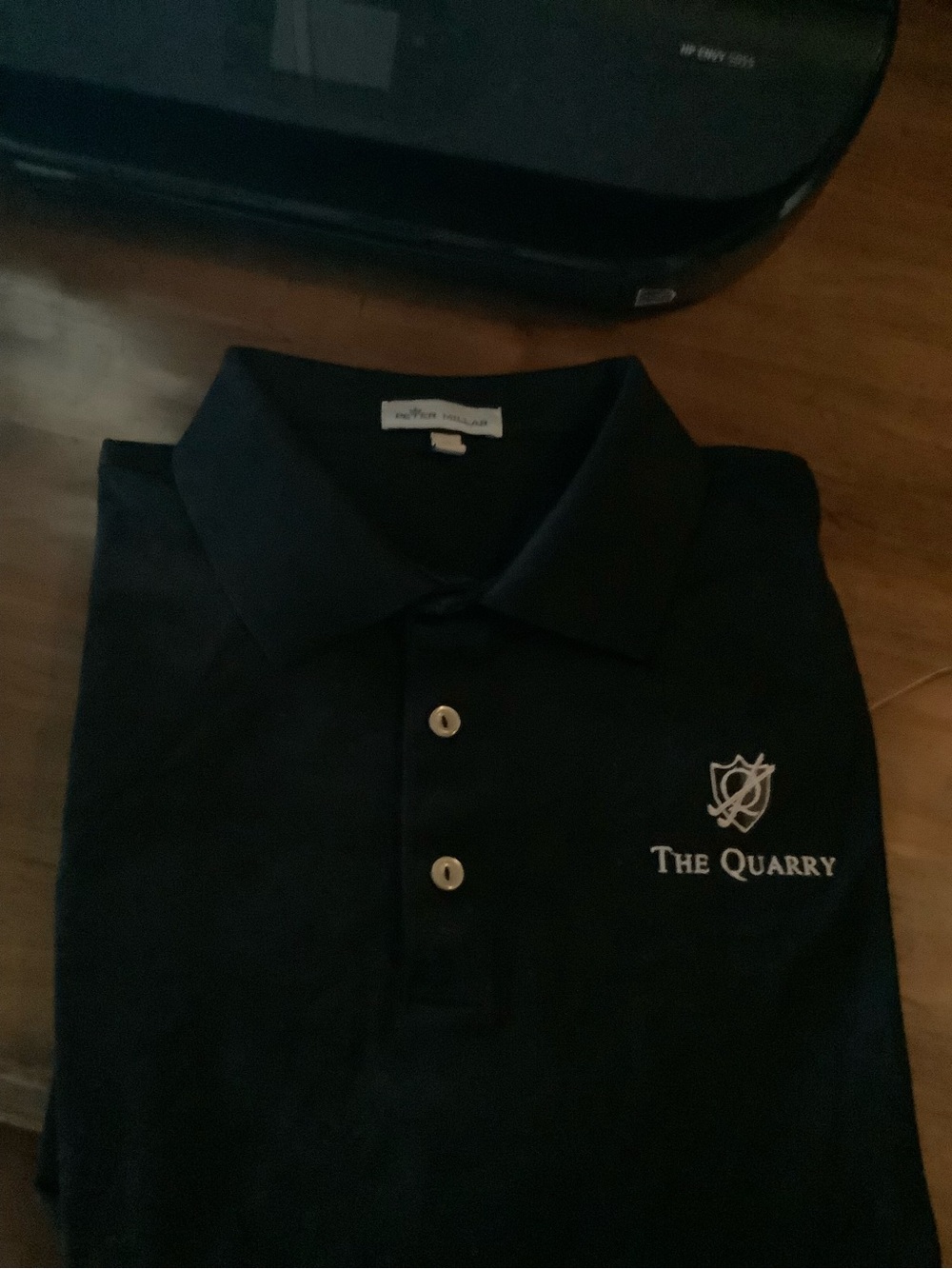 Peter Millar Black Polo with The Quarry Embroidery La Quinta, California.